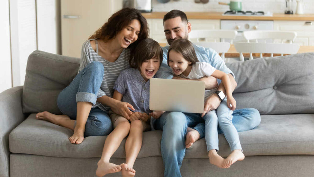Family watching YouTube on a laptop