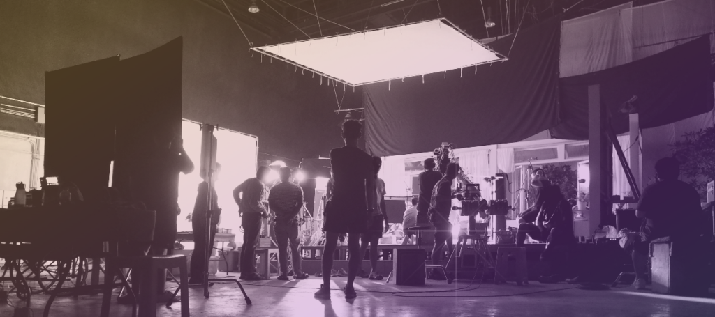 Crew filming in a studio