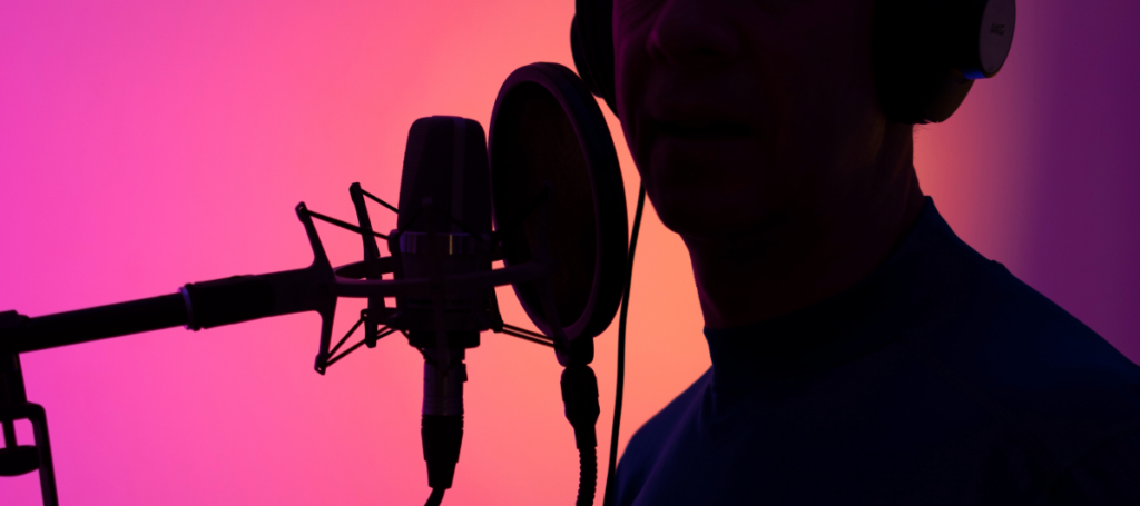 Man recording voiceover for his YouTube channel. 